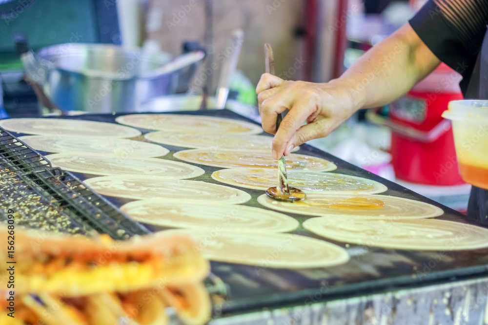 Obraz premium Thai style pancake with coconut, sugar, sesame, Sweet egg floss