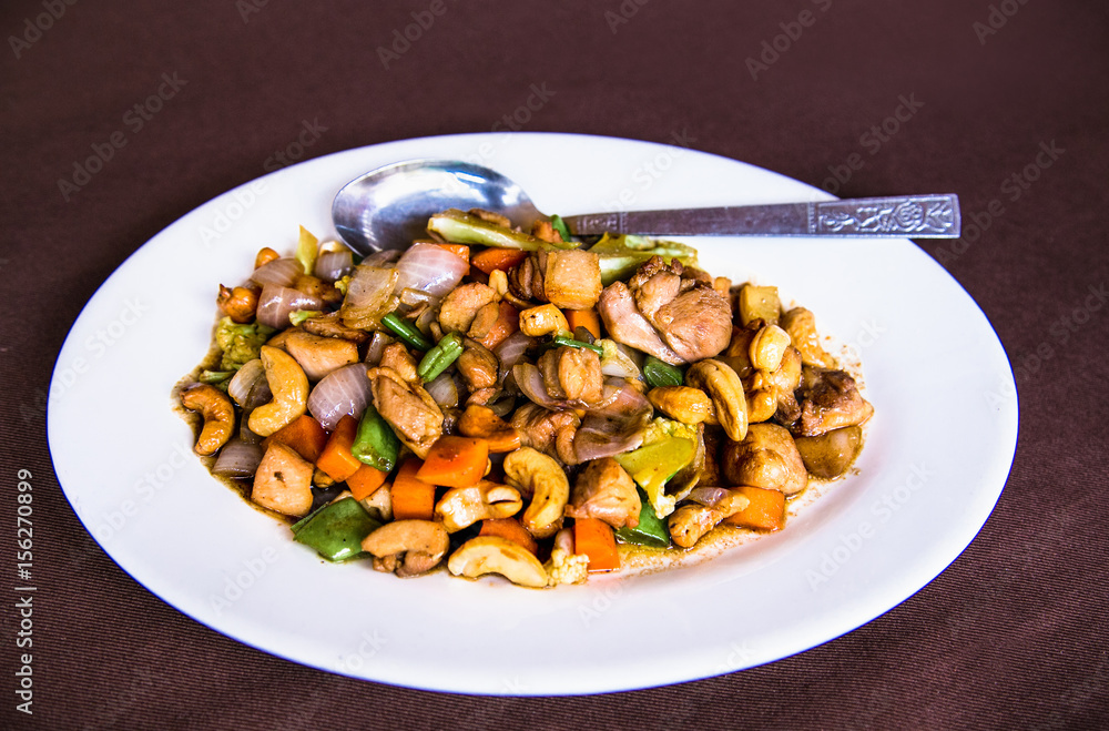 Plates of Asian food - chicken with vegetables, Myanmar Plates of Asian food - chicken with vegetables, Myanmar