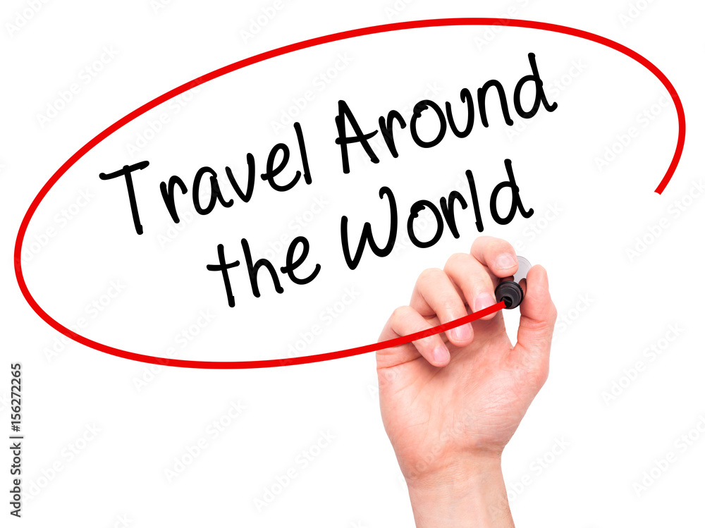 Man Hand writing Travel Around the World with black marker on visual screen Man Hand writing Travel Around the World with black marker on visual screen