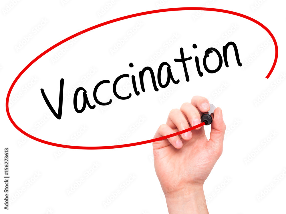 Man Hand writing Vaccination with black marker on visual screen Man Hand writing Vaccination with black marker on visual screen