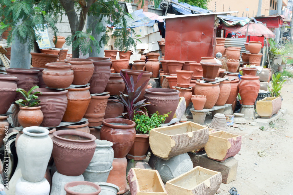 Outdoor sale of ceramic and wooden vase Outdoor sale of ceramic and wooden vase