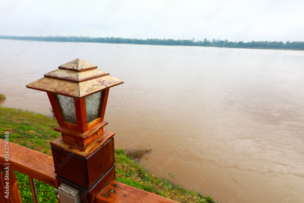Wood lamp beside river