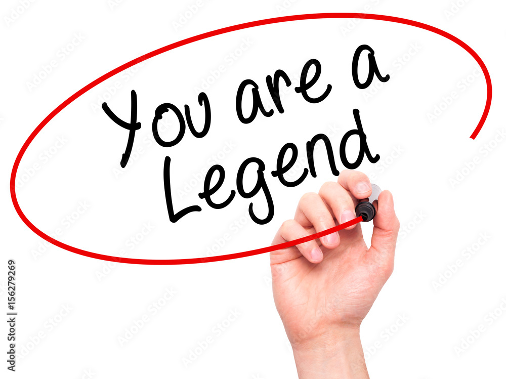 Man Hand writing You are a Legend with black marker on visual screen Man Hand writing You are a Legend with black marker on visual screen