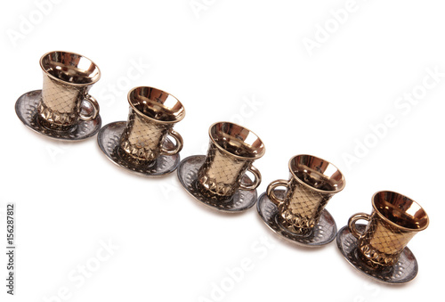 Ancient porcelain tea cups on a white background