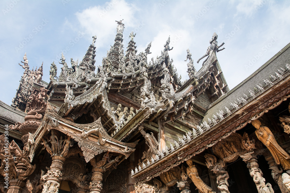 Naklejka premium Details of Sanctuary of Truth temple (Prasat Satchatham),handmade reliefs and sculptures, Pattaya, Thailand