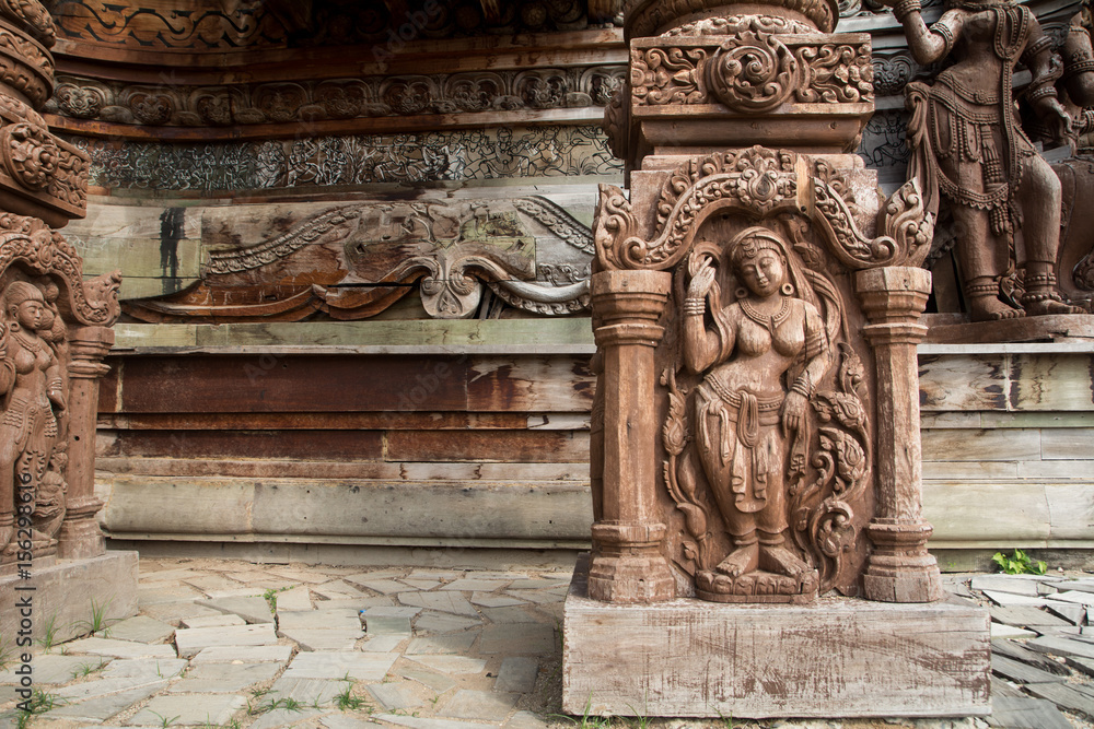 Details of Sanctuary of Truth temple (Prasat Satchatham),handmade reliefs and sculptures, Pattaya, Thailand