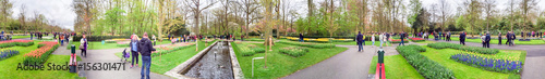 Photography KEUKENHOF; THE NETHERLANDS - APRIL 2015: Tourists visit Keukenhof gardens in spring