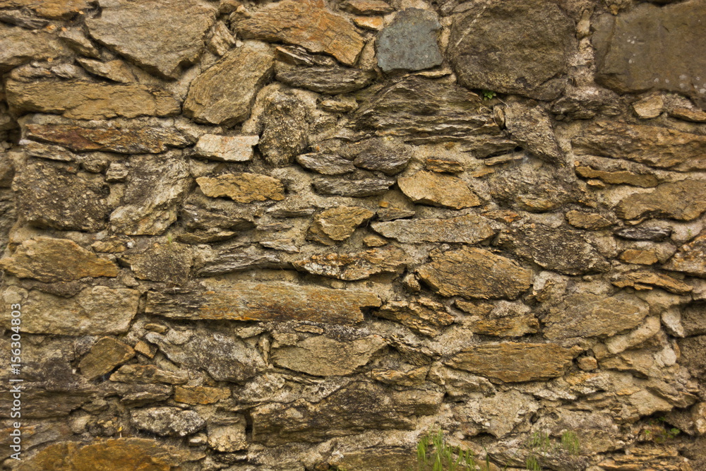 Fototapeta premium Background of old stone wall texture