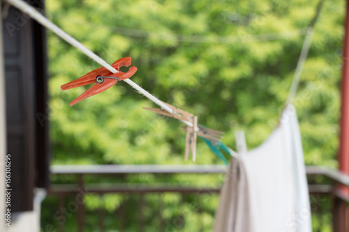 A plastic peg on a washing line.