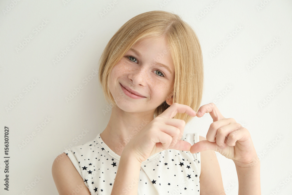Portrait of cheerful teenager girl with freckles on white background Portrait of cheerful teenager girl with freckles on white background
