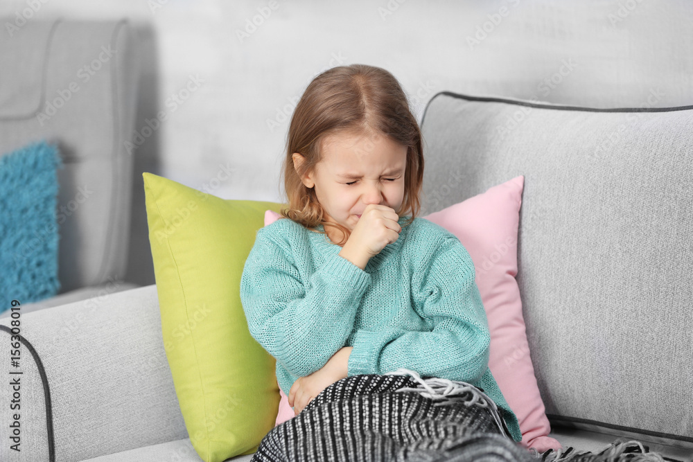 © Africa Studio - Small ill girl on couch at home © Africa Studio - Small ill girl on couch at home