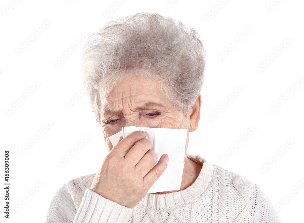 Mature ill woman with tissue, isolated on white. Concept of allergy Mature ill woman with tissue, isolated on white. Concept of allergy