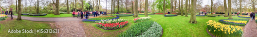 Photography KEUKENHOF; THE NETHERLANDS - APRIL 2015: Tourists visit Keukenhof gardens in spring