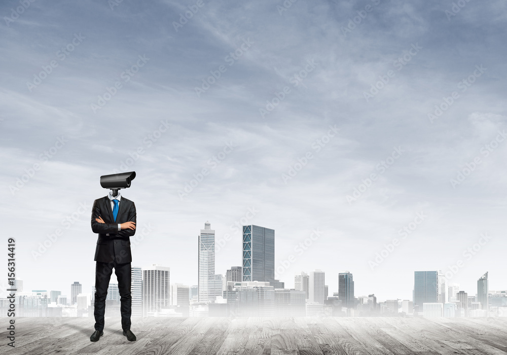 Concept of security and privacy protection with camera headed man Concept of security and privacy protection with camera headed man