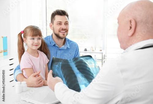 Little girl with father at ...
