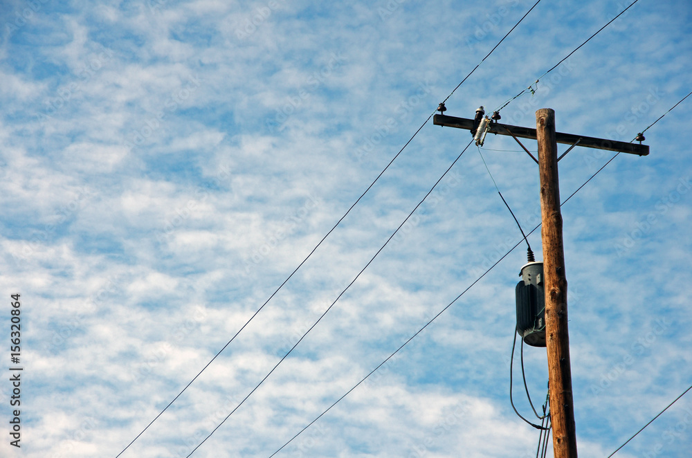 Electricity tower and blue sky with stratus clouds Electricity tower and blue sky with stratus clouds
