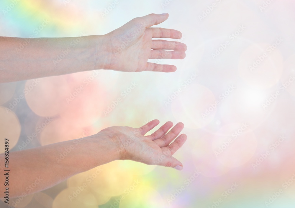 Hands open friendly with sparkling light bokeh background Hands open friendly with sparkling light bokeh background