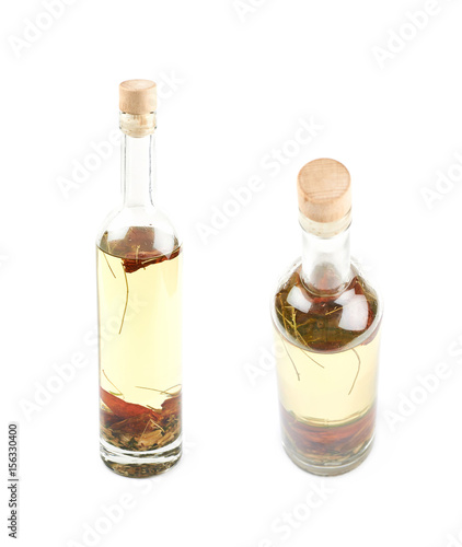 Glass bottle of oil isolated