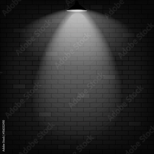 Vector scene illuminated spotlight. Black bricks wall background