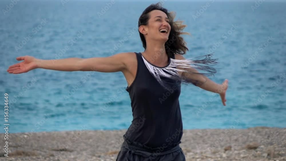 Pretty, happy woman dancing, turning around near sea, super slow motion 240fps
Pretty, happy woman dancing, turning around near sea, super slow motion 240fps