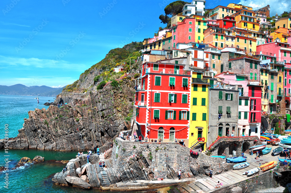 Riomaggiore fisherman village.Is one of five famous colorful villages of Cinque Terre National Park in Italy, suspended between sea and land on sheer cliffs. Liguria region of Italy.