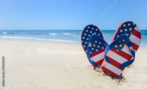 Patriotic USA background on the sandy beach photo
