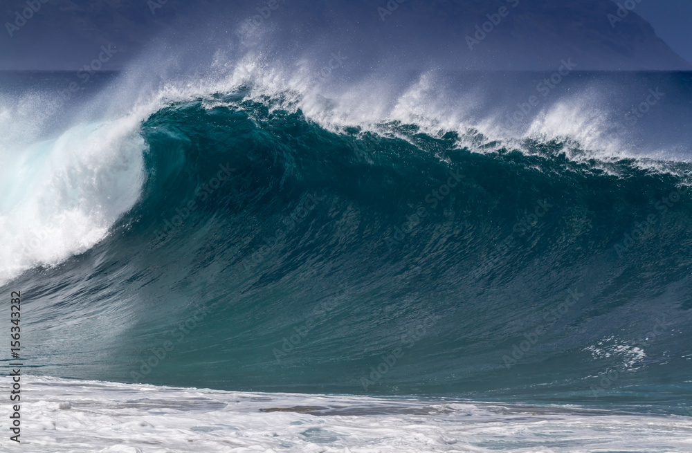 Big breaking Ocean wave barrel on the north shore of Oahu Hawaii Big breaking Ocean wave barrel on the north shore of Oahu Hawaii