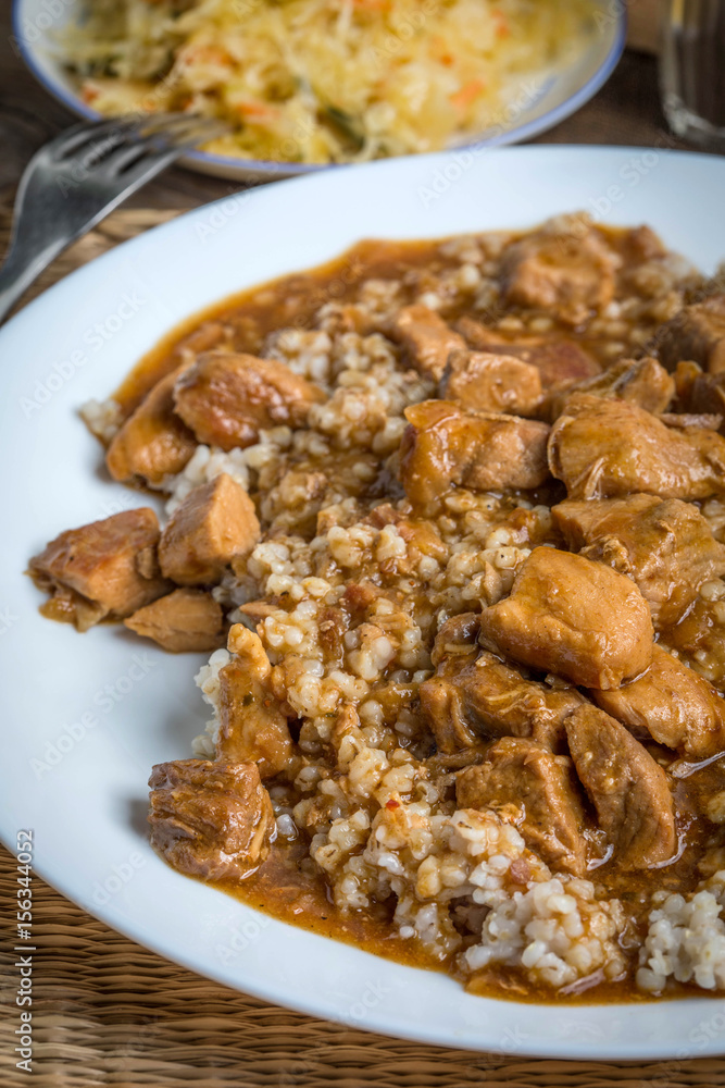 Barley groats with stewed meat.