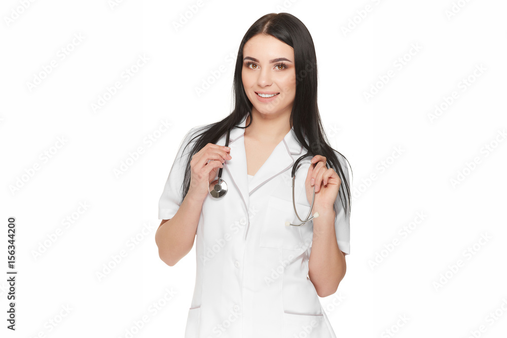 Beautiful and young in white uniform with stethoscope around neck. Beautiful and young in white uniform with stethoscope around neck.