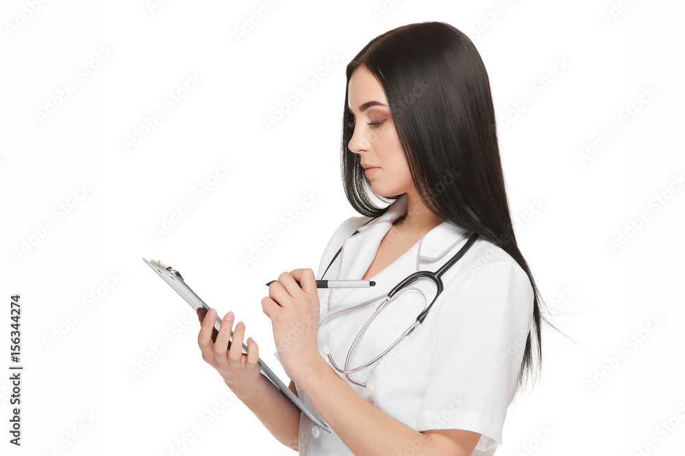 Serious female doctor with stethoscope around neck registering patient. Serious female doctor with stethoscope around neck registering patient.