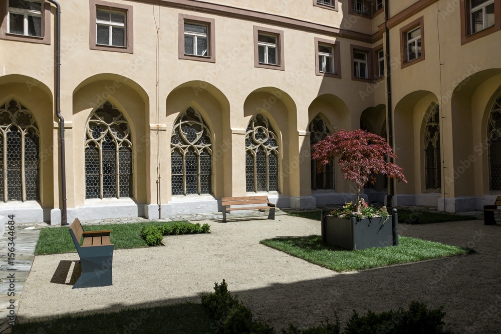 Naklejka premium Beautiful quiet monastery park in the summer