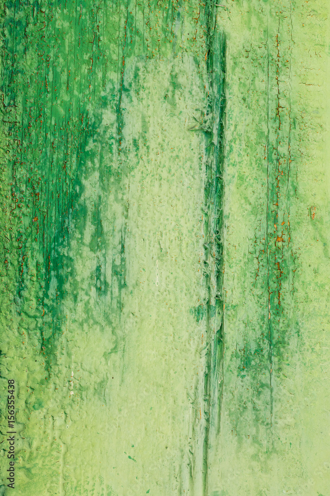 Fototapeta premium aged wooden plank with decayed green paint texture
