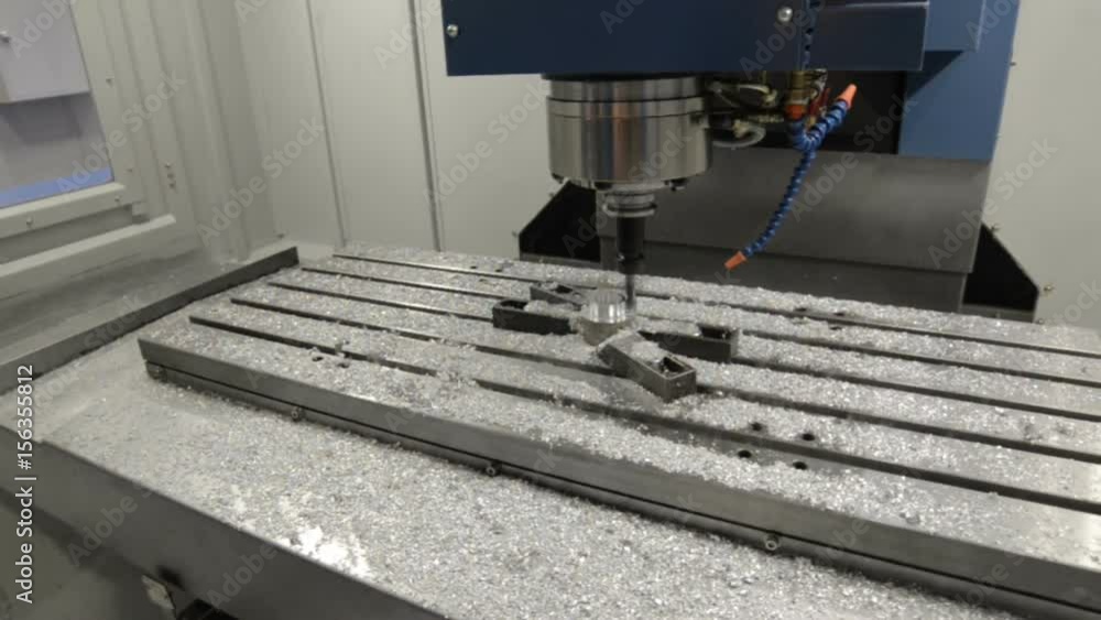Vertically CNC milling machine makes the part. Vertically CNC milling machine makes the part.