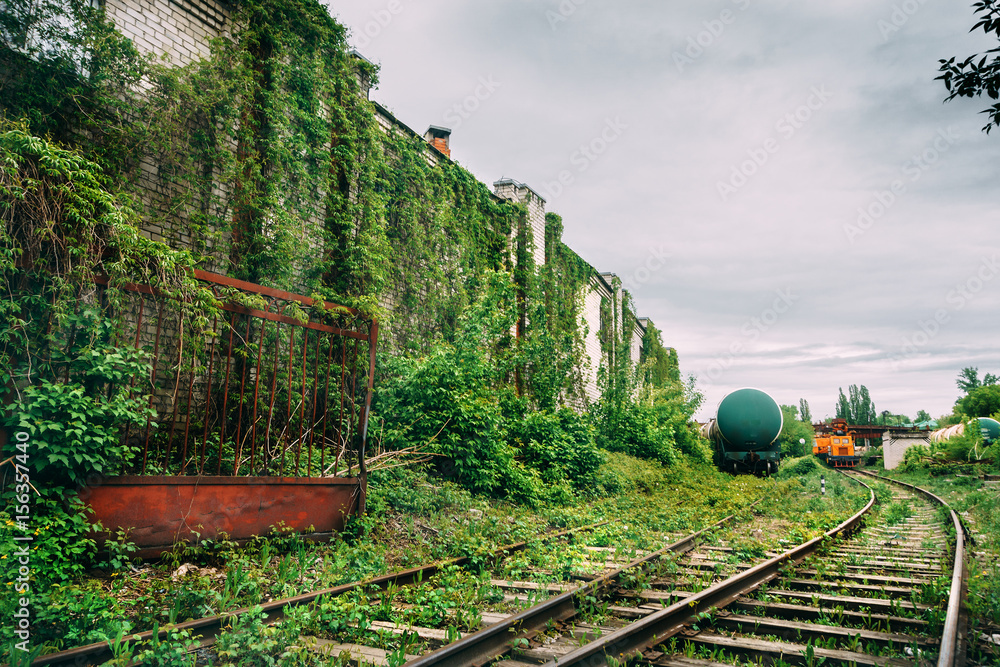 old-industrial-railroad-station-platform-post-apocalypse-urbex-concept