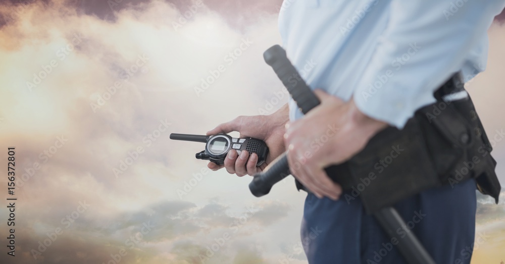 Security man outside with cloudy sky