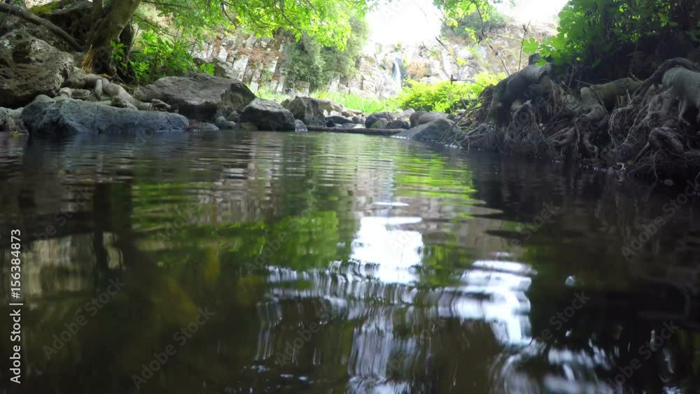 Small creek seen from the ground. Sardinia, Italy Small creek seen from the ground. Sardinia, Italy