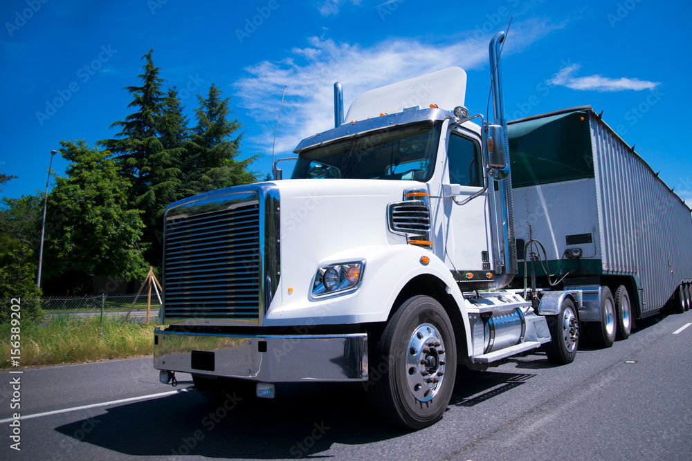 Fototapeta premium Super rig semi truck day cab bulk trailer on road