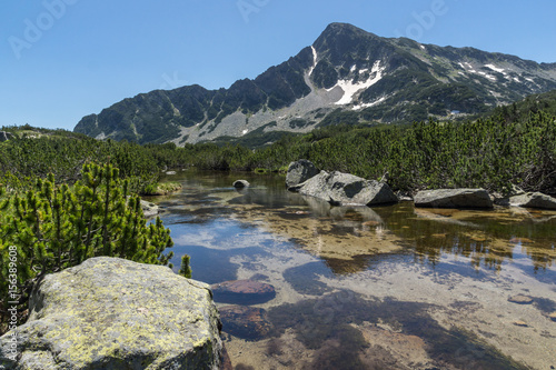 Landscape with Reflection of Sivrya peak in Banski lakes, Pirin Mountain, Bulgaria