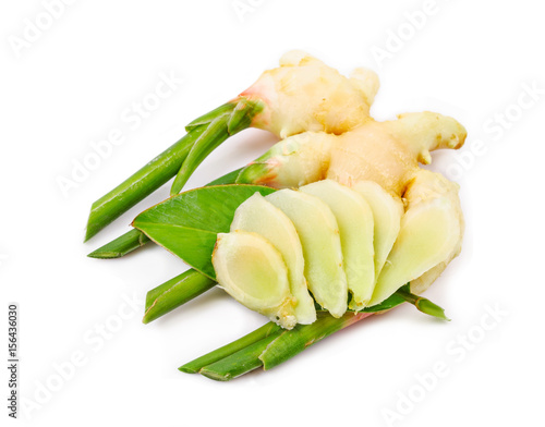 Fresh ginger and green leaves. photo