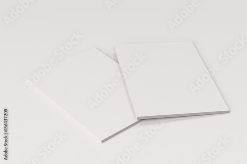 Two blank white closed brochure mock-up on white background