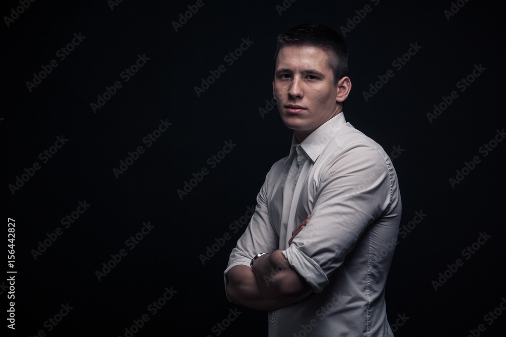 one young man, portrait, side view, copy space,black background one young man, portrait, side view, copy space,black background