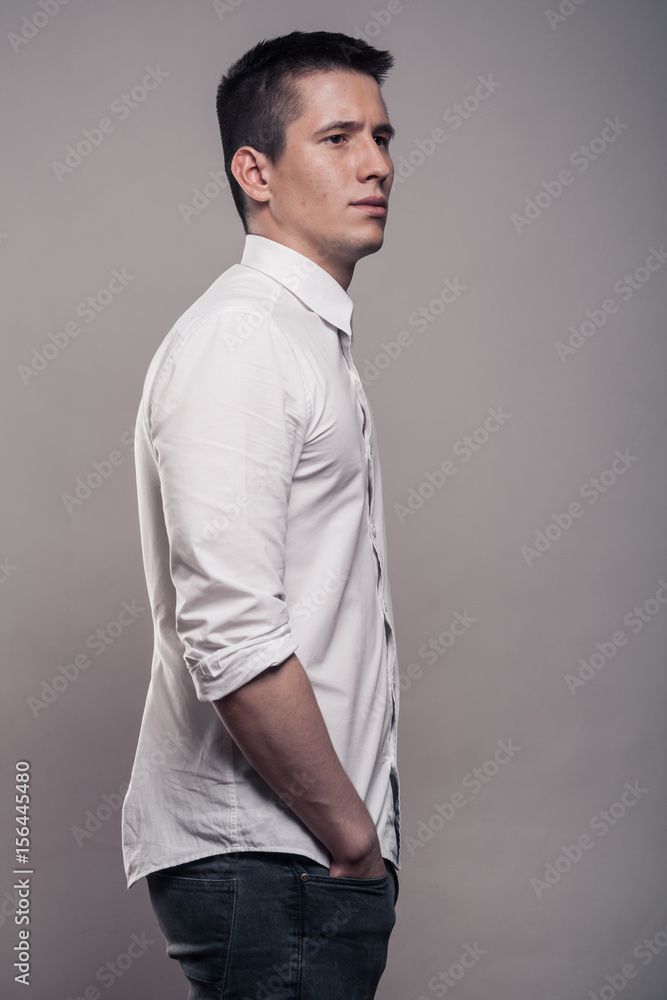 one young man, side view, portrait, upper body, white shirt, Stock Photo |  Adobe Stock