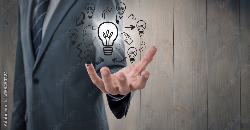 Business man mid section with lightbulb doodles Business man mid section with lightbulb doodles