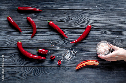 hot food with red chili on wooden table background top view