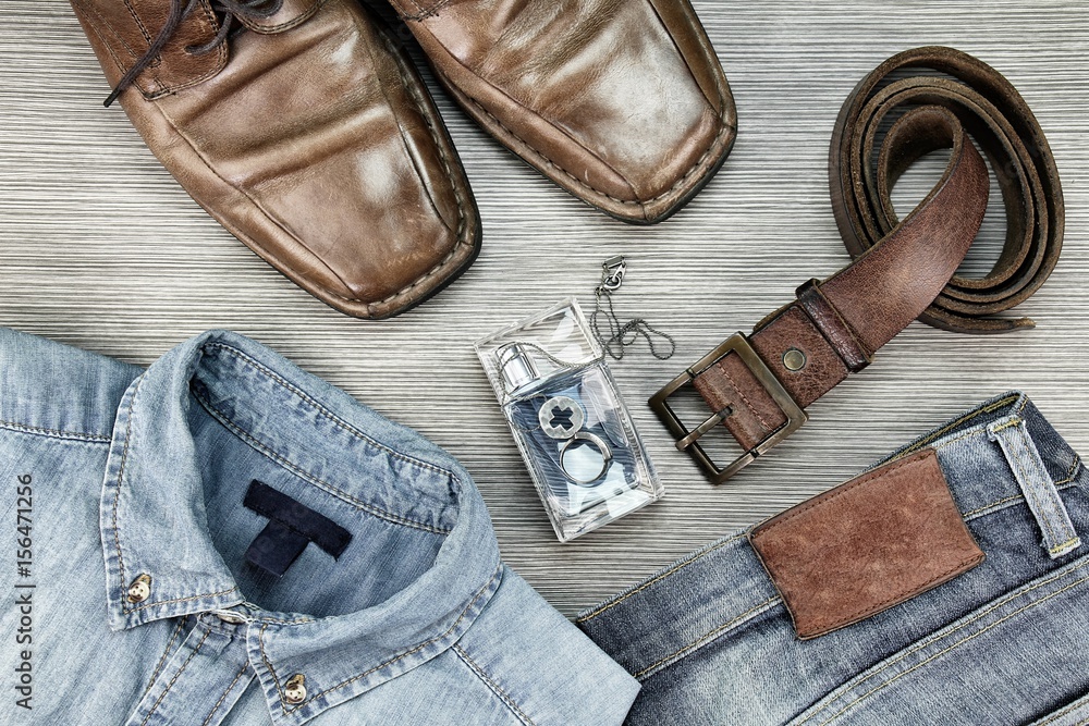 Men Fashion, Smart and casual outfits, Set of clothes and various  accessories, Trendy Hipster style outfits, Jeans, Leather Shoes, Leather  belt, Perfume, Necklaces, Ring. (Color Process) Stock Photo | Adobe Stock