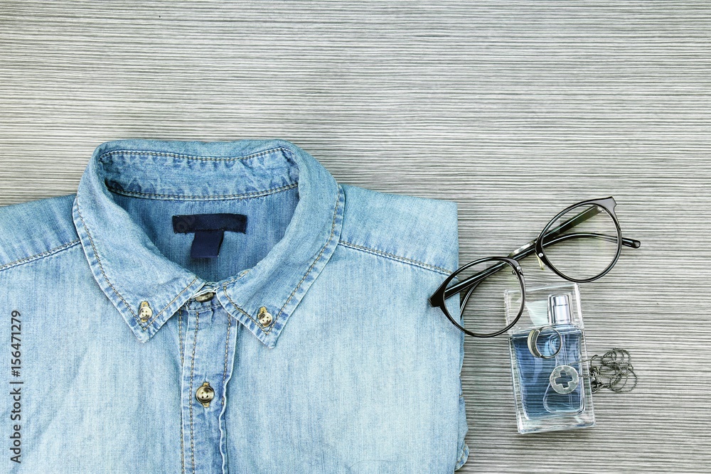 Men Fashion, Casual outfits, Blue jeans Shirt, Perfume, Necklaces, Nerd  Glasses, Ring. foto de Stock | Adobe Stock