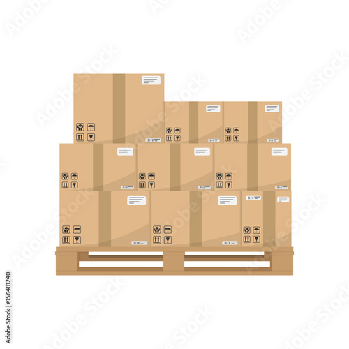 Boxes on wooded pallet. Brown closed carton delivery packaging boxes with fragile signs on wooden pallet
