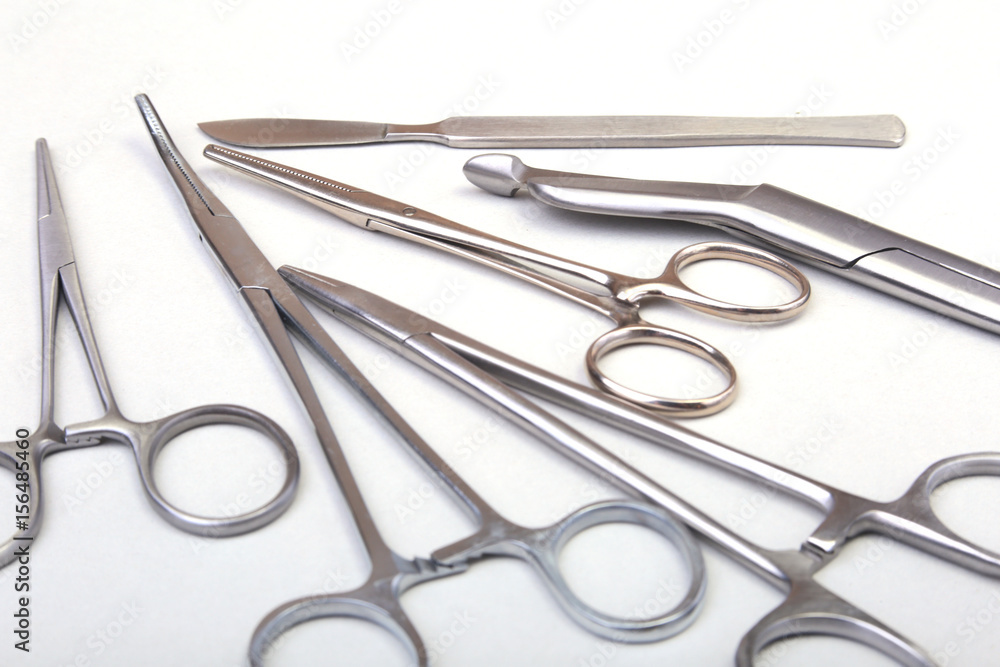 Close Up Surgical instruments and tools on white background. Selective focus. Close Up Surgical instruments and tools on white background. Selective focus.