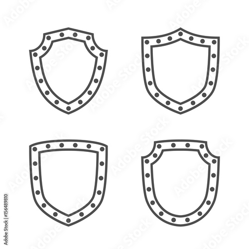 Shield shape icons set. Black silhouette signs isolated on white. Symbol protection, arms, coat honor, security, safety. Flat retro style design Element vintage heraldic emblem Vector illustration