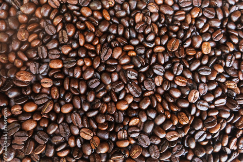 Coffee beans background. roasted coffee beans  can be used as a background. Close up and Macro.